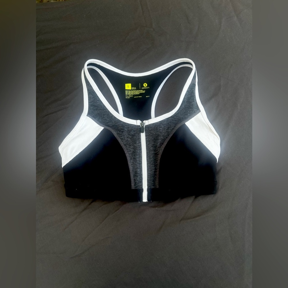 XERSION Reflective Black Pushup Sports Bra with Front Zipper & Gray/White Detail